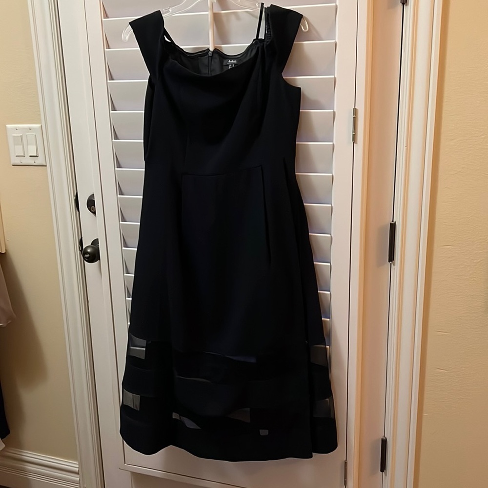 Aidan Mattox black off shoulder cocktail dress.